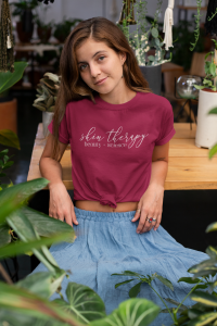 Knotted T Shirt Mockup Of A Woman At A Table Surrounded By Plants 27083 - Stickersandmore.com