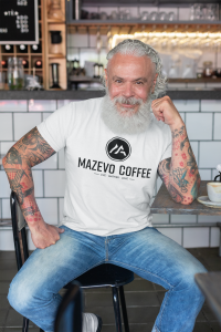 T Shirt Mockup Of A Tattooed Man At A Cafe 28416 2 - Stickersandmore.com